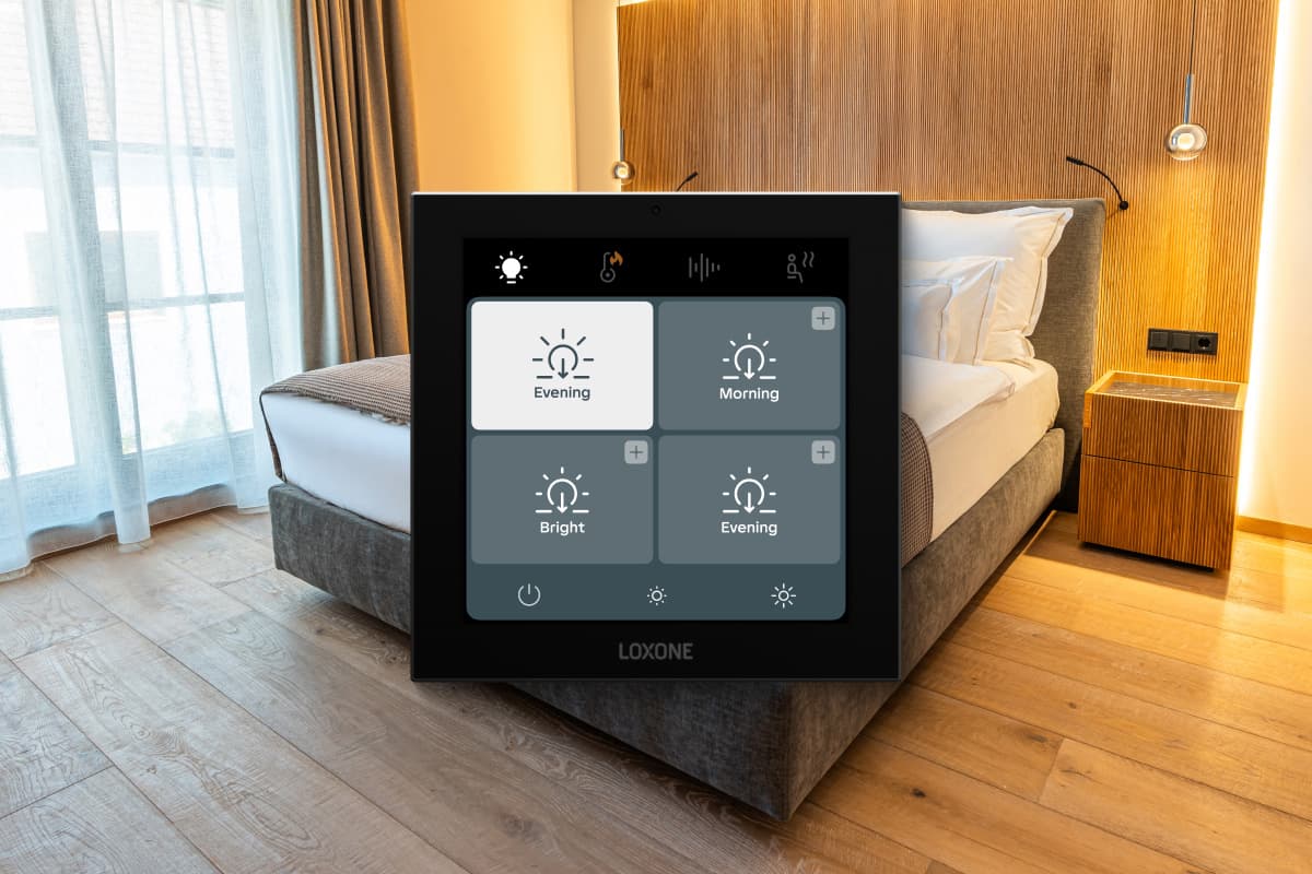 Bedroom waking gently with automated blinds and warm lighting