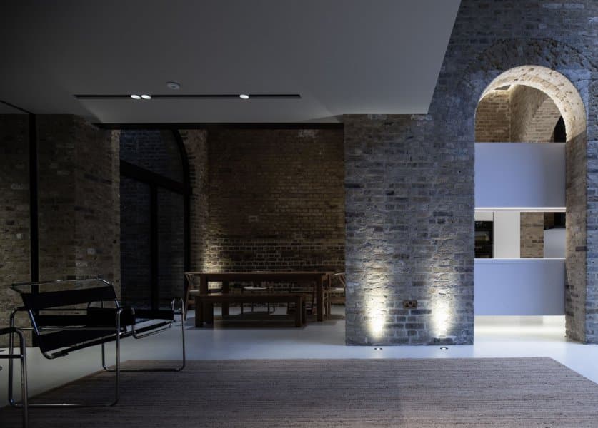 Brick arches on the communal ground floor of Station House, a London warehouse conversion